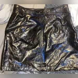 Mini black leather skirt